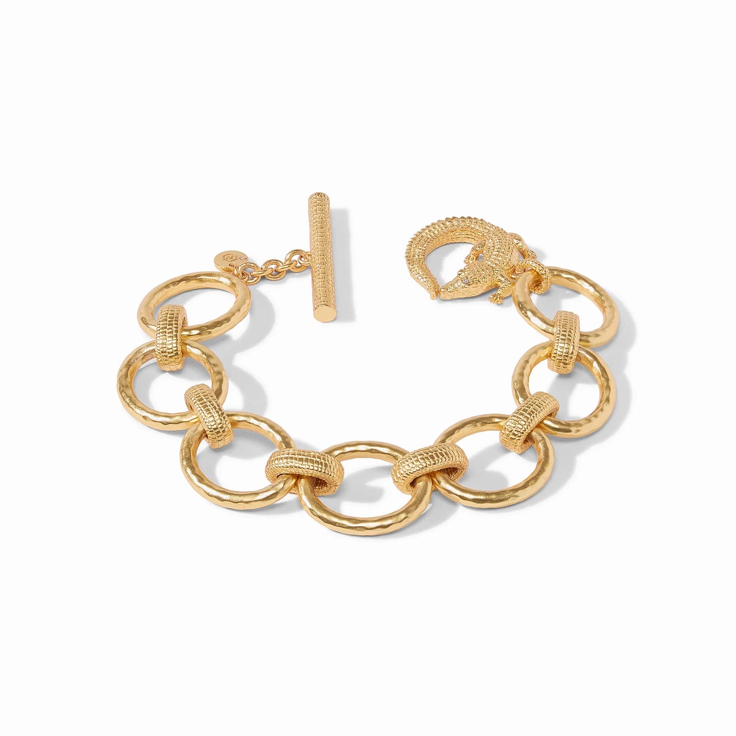 Alligator Link Bracelet by Julie Vos features hammered oval links with textured connecting links, finished with an alligator toggle ring and textured toggle.  24K gold plate, CZ. Shop at The Painted Cottage in Edgewater, MD.