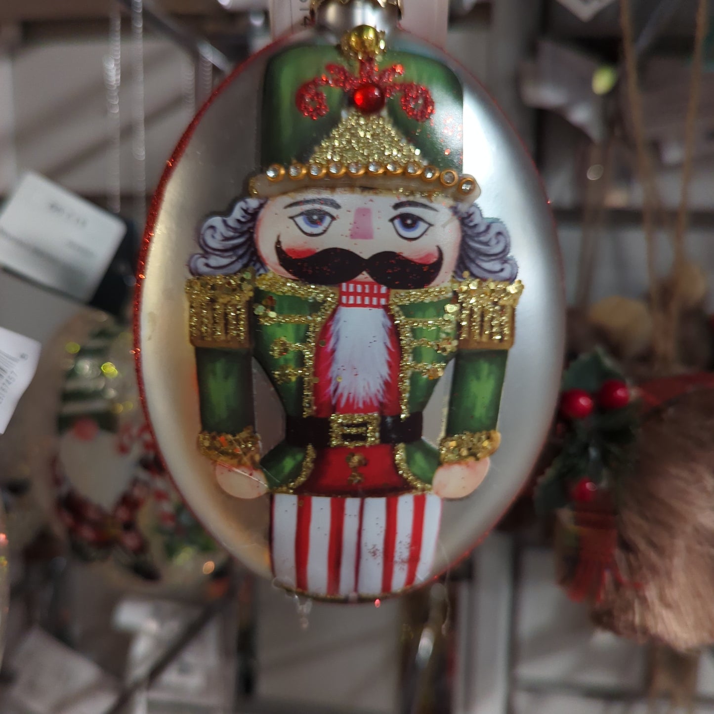 GLASS OVAL NUTCRACKER ORNAMENT GREEN