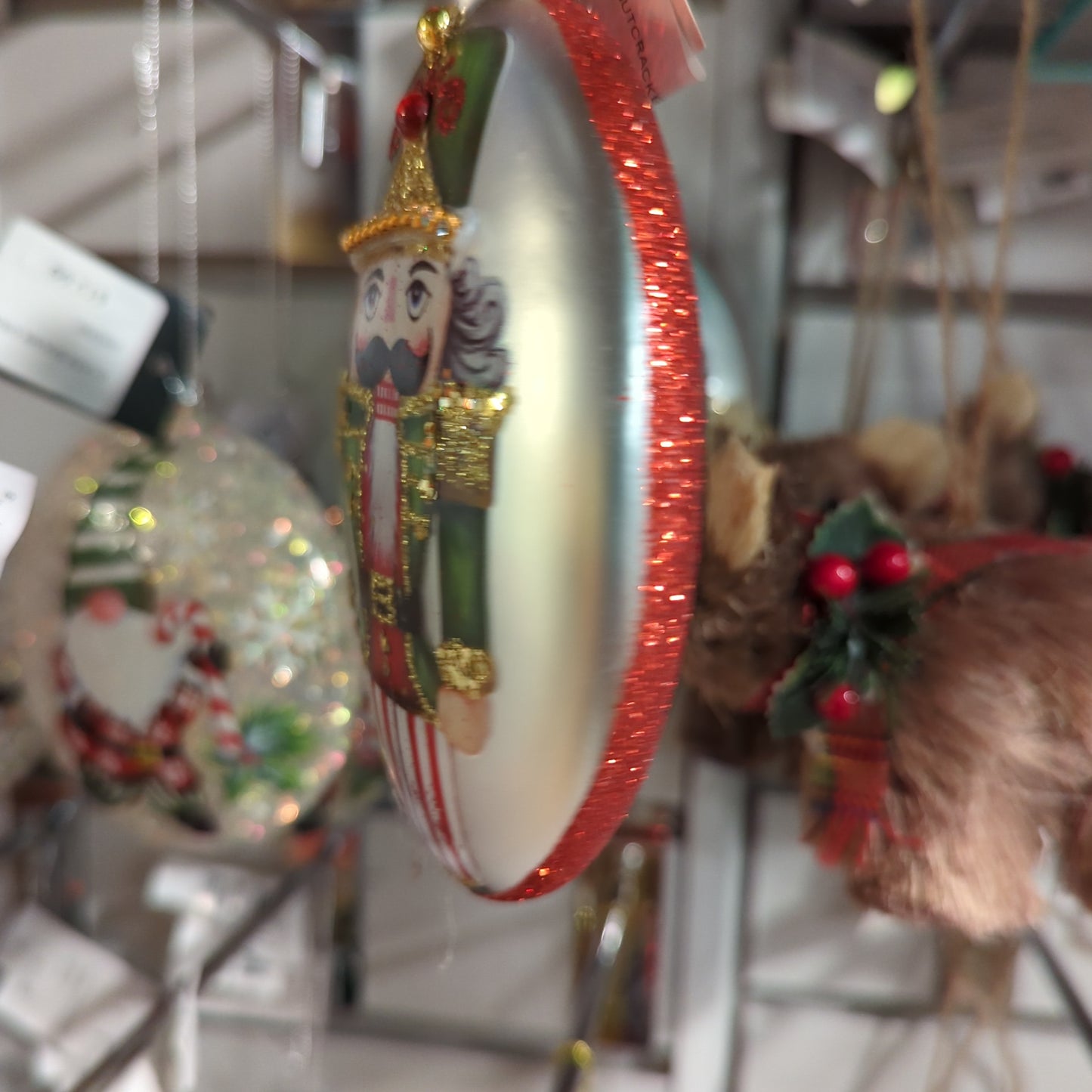 GLASS OVAL NUTCRACKER ORNAMENT GREEN