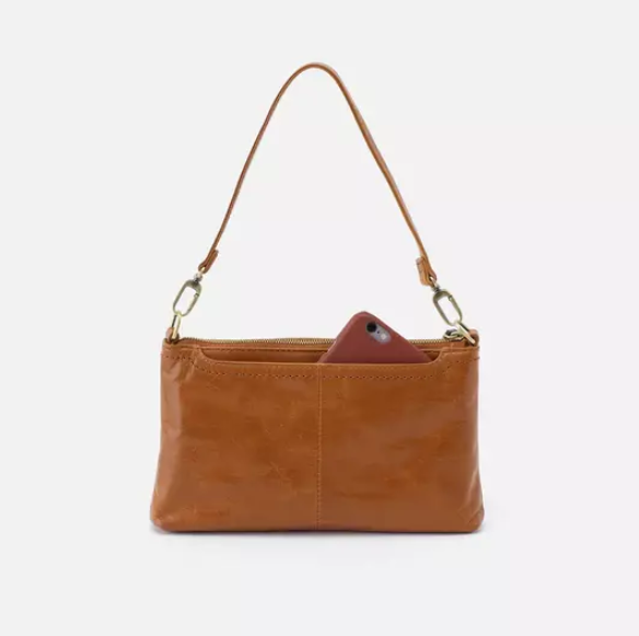 This iconic and convertible Darcy Truffle by HOBO can be worn three ways: crossbody, baguette bag and wristlet. Crafted in our Vintage Hide leather that only gets more beautiful over time with use and wear. For sale at the Painted Cottage in Edgewater, MD