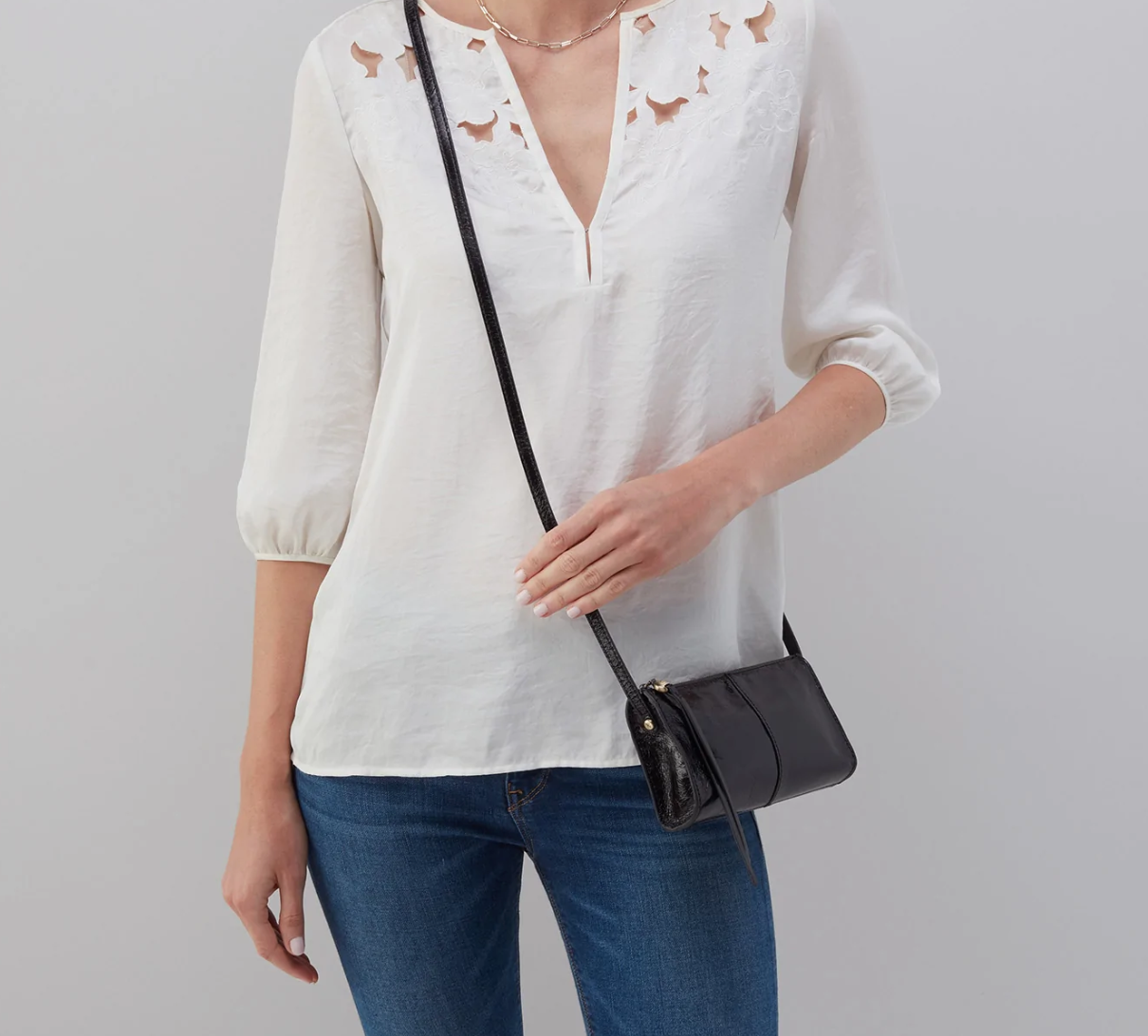 The Jewel in black by HOBO is a small crossbody designed to hold the essentials. It has a compact size with enough space for your phone, keys and cards. Check it out at the Painted Cottage in Edgewater, MD