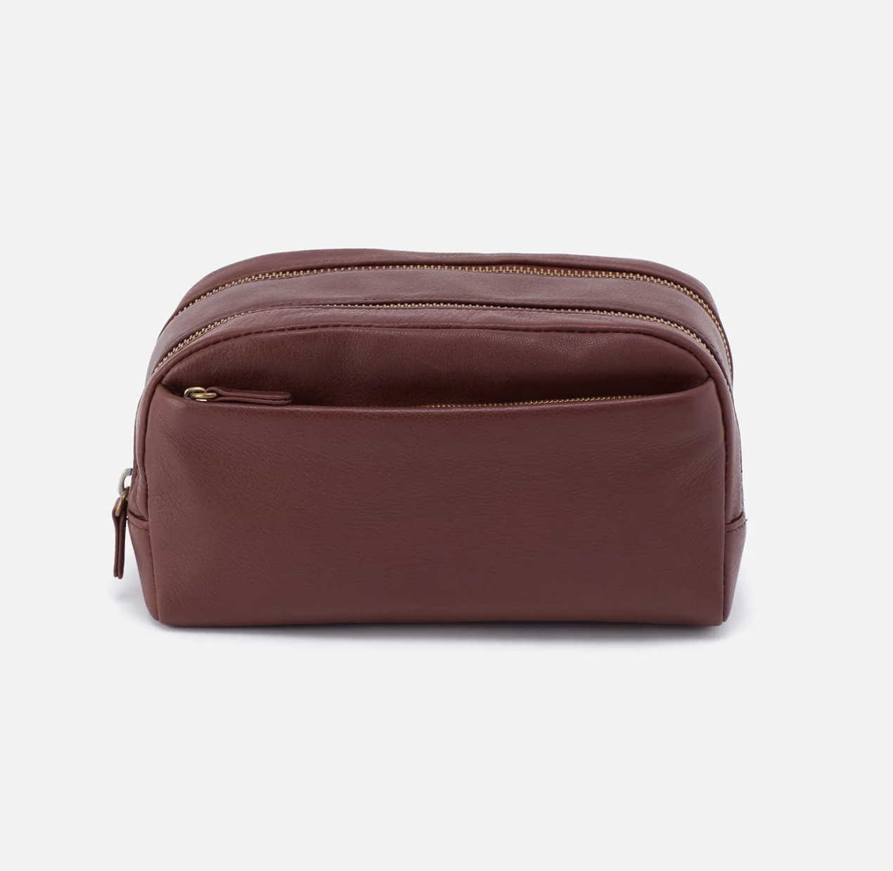 The Leather Men's Travel Kit in brown has a two zipper compartments and a lined interior perfect for keeping your toiletries organized. For sale at the Painted Cottage in Edgewater, MD