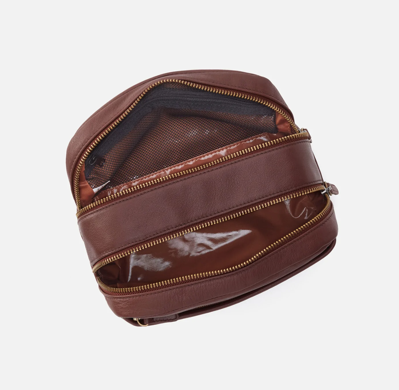 The Leather Men's Travel Kit in black has a two zipper compartments and a lined interior perfect for keeping your toiletries organized. For sale at the Painted Cottage in Edgewater, MD