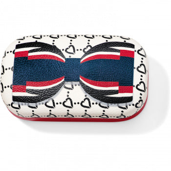 Brighton Fashionista Allure Beau Mini Box features black hearts with big red, wh, blu and blk bowtie. can be used for medication, mints, paperclips, etc, dimensions width: 3 1/4" height: 2" depth: 2" available at The Painted Cottage in Edgewater, MD.