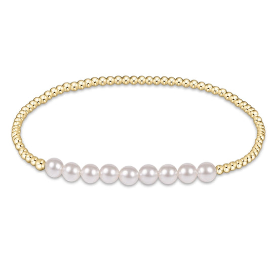 Classic Gold Beaded Bliss 2.5mm Bead Bracelet - 5mm Pearl by eNewton. 14kt gold-filled beads and bar of nine pearls. Shop at The Painted Cottage in Edgewater, MD.
