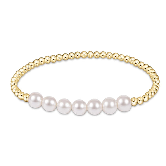 Classic Gold Beaded Bliss 3mm Bead Bracelet - 6mm Pearl by eNewton. Made with 3mm 14kt gold-filled beads and 6mm pearls. Shop at The Painted Cottage in Edgewater, MD.