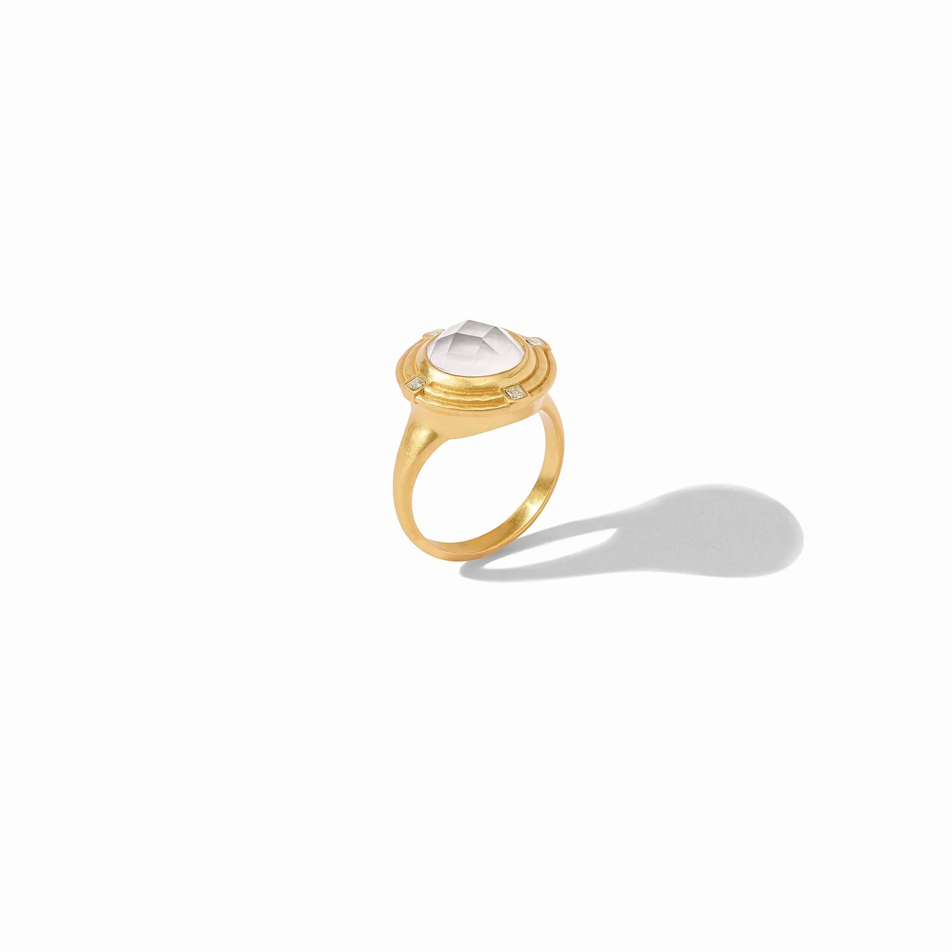 Astor Ring - Iridescent Clear Crystal by Julie Vos signet ring featuring a sparkling rose cut gem set in a surround of two lightly hammered golden walls embellished with four CZs. 24K gold plate, imported glass, CZ Width: 0.65 inches. Shop at The Painted Cottage an Annapolis boutique.
