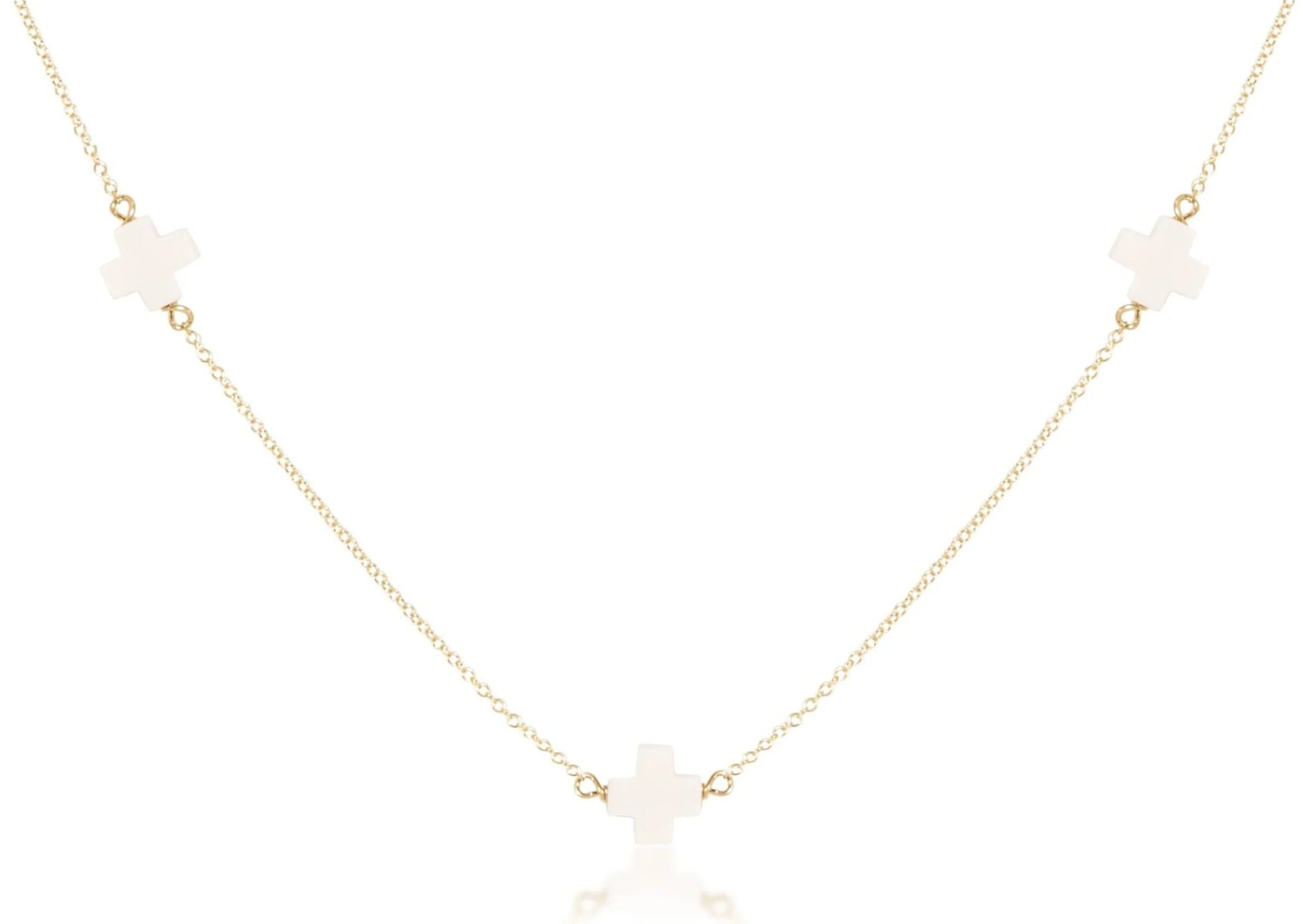 17" Choker Simplicity Chain Gold - Signature Cross Off White by eNewton. 14kt gold-filled chain and signature cross. Shop at The Painted Cottage in Edgewater, MD.