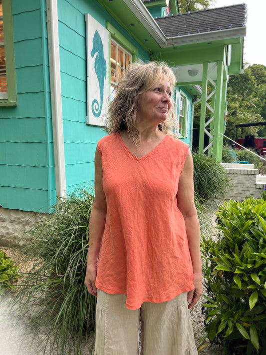Coral V Neck Cut Tank Top by Match Point. Linen sleevless v-neck bias cut tank is floaty and fun, dress up or down. Shop at The Painted Cottage an Annapolis Boutique.