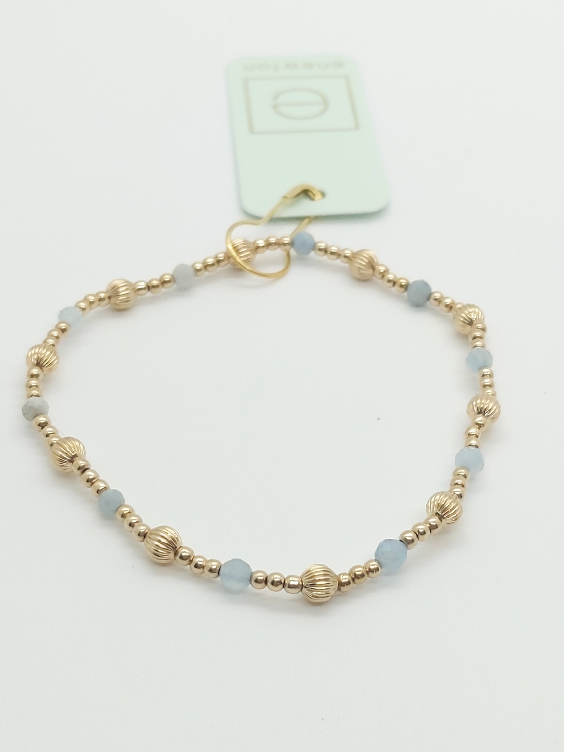 Made with a mix of 2mm, 14kt gold-filled beads, 4mm dignity 14kt gold-filled beads, and 3mm Aquamarine gemstones.