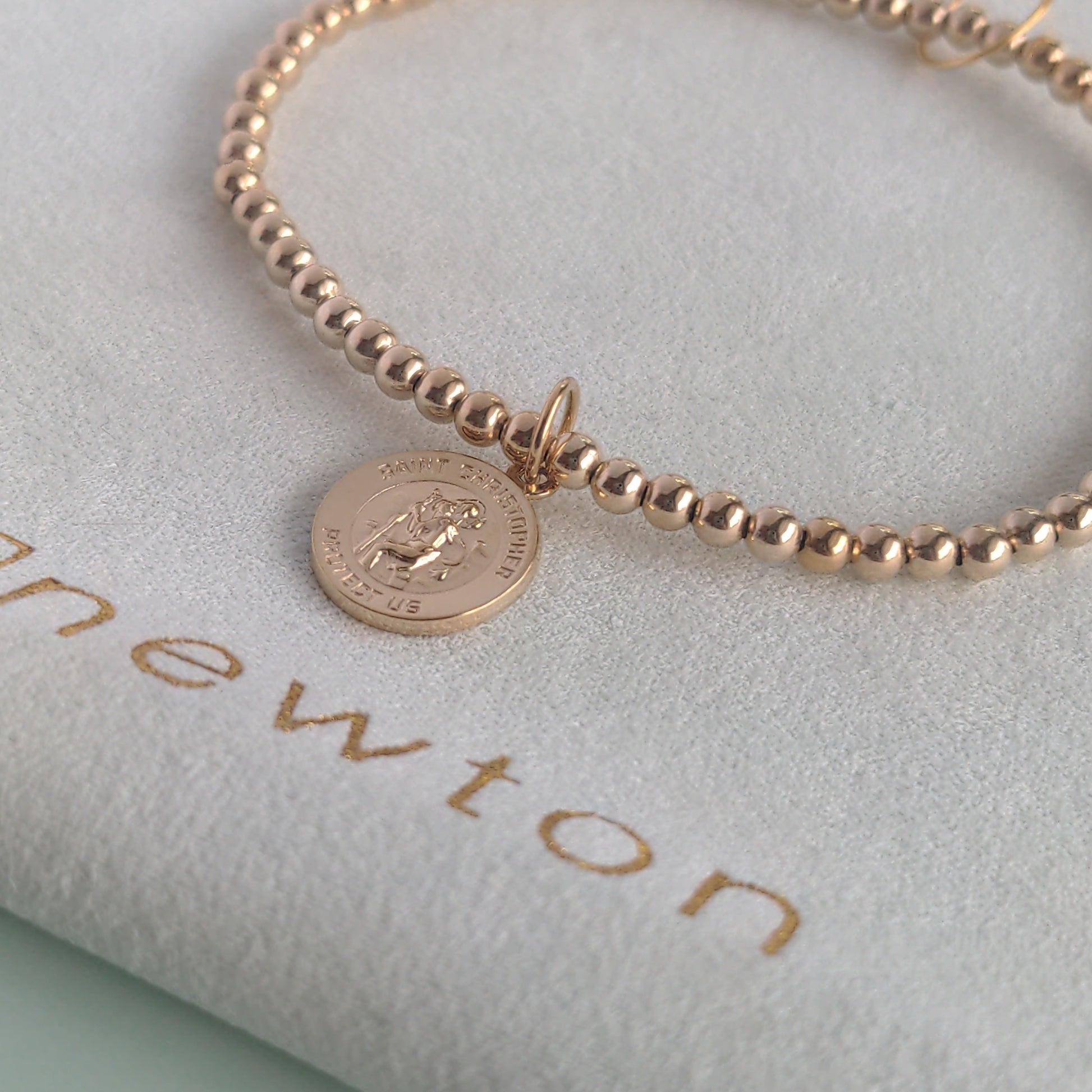Classic gold 3mm Protection charm bracelet by eNewton. Shop at The Painted Cottage in Edgewater, MD.