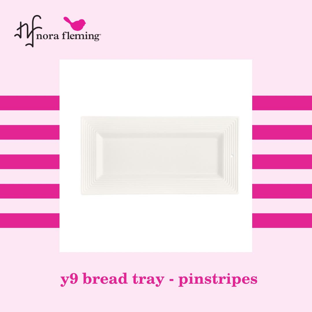 Y9 Nora Fleming Bread Tray Pinstripes, measures 15" x 7 1/2". Microwave and dishwasher safe. Shop at The Painted Cottage a Maryland Boutique