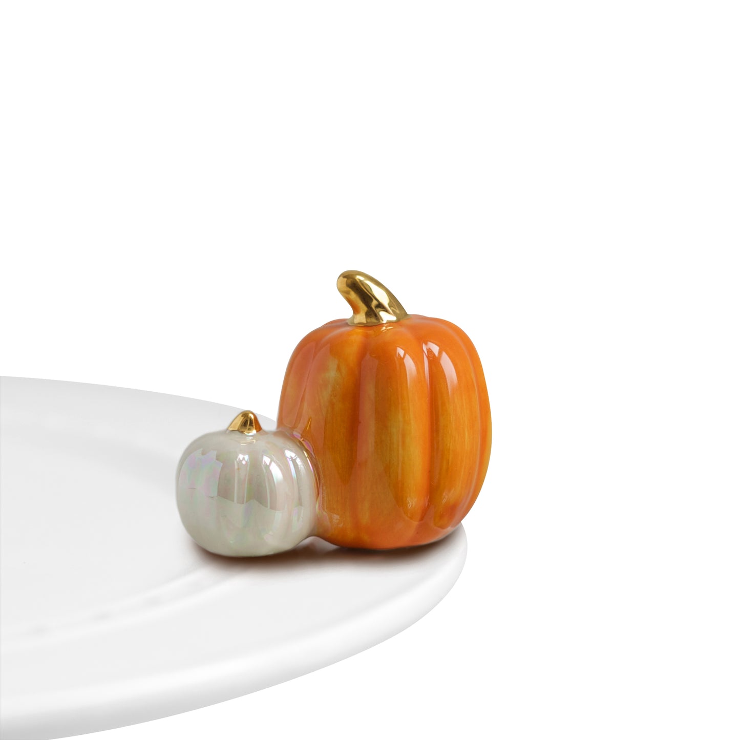 A02 Nora Fleming Pumpkin Spice mini features one lg orange pumpkin and one sm white pumpkin with gold accent on stem. Shop at The Painted Cottage an Annapolis Boutique.