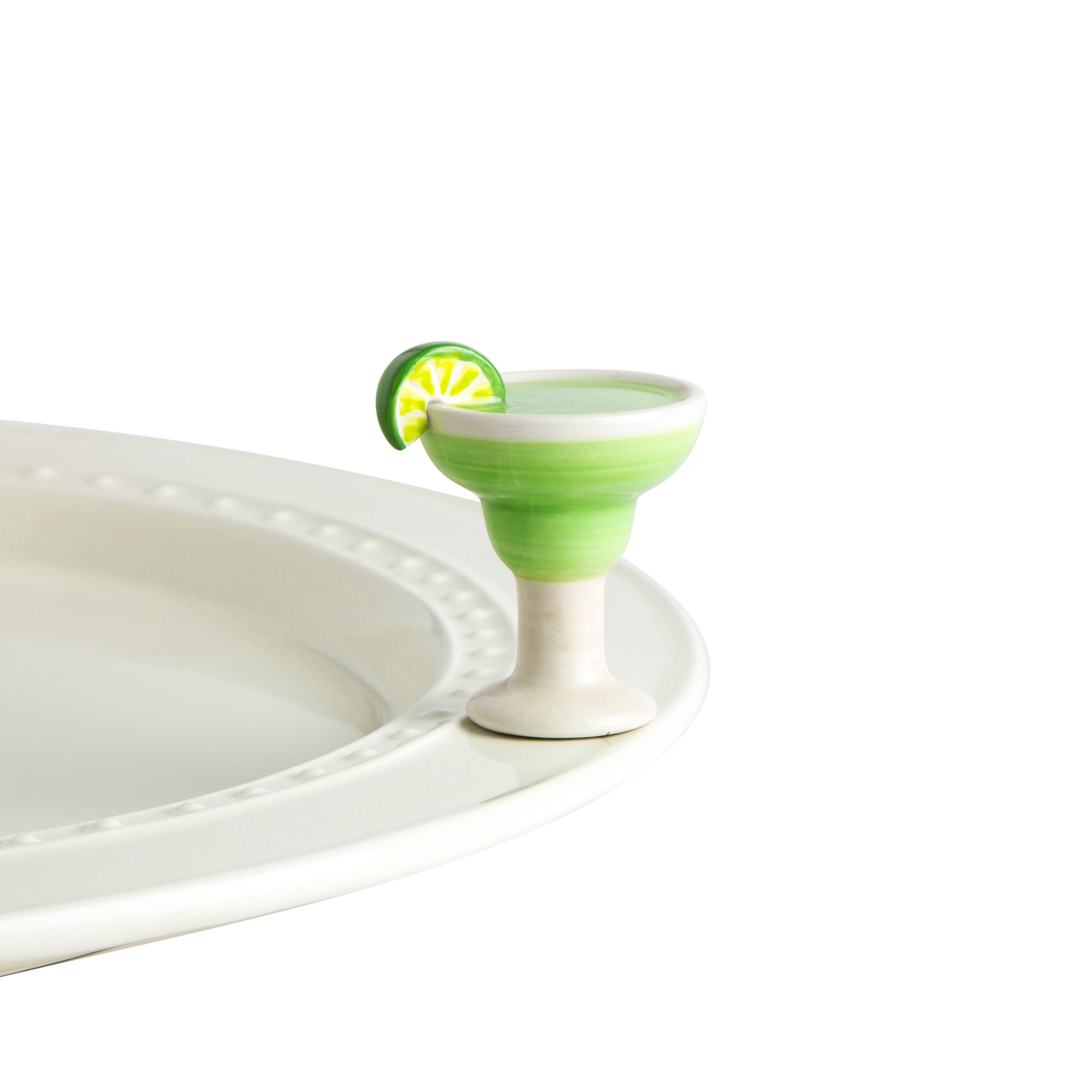 A130 Nora Fleming Lime & Salt Please mini features a green and white margarita glass with a lime slice on rim. Shop The Painted Cottage an Annapolis boutique.