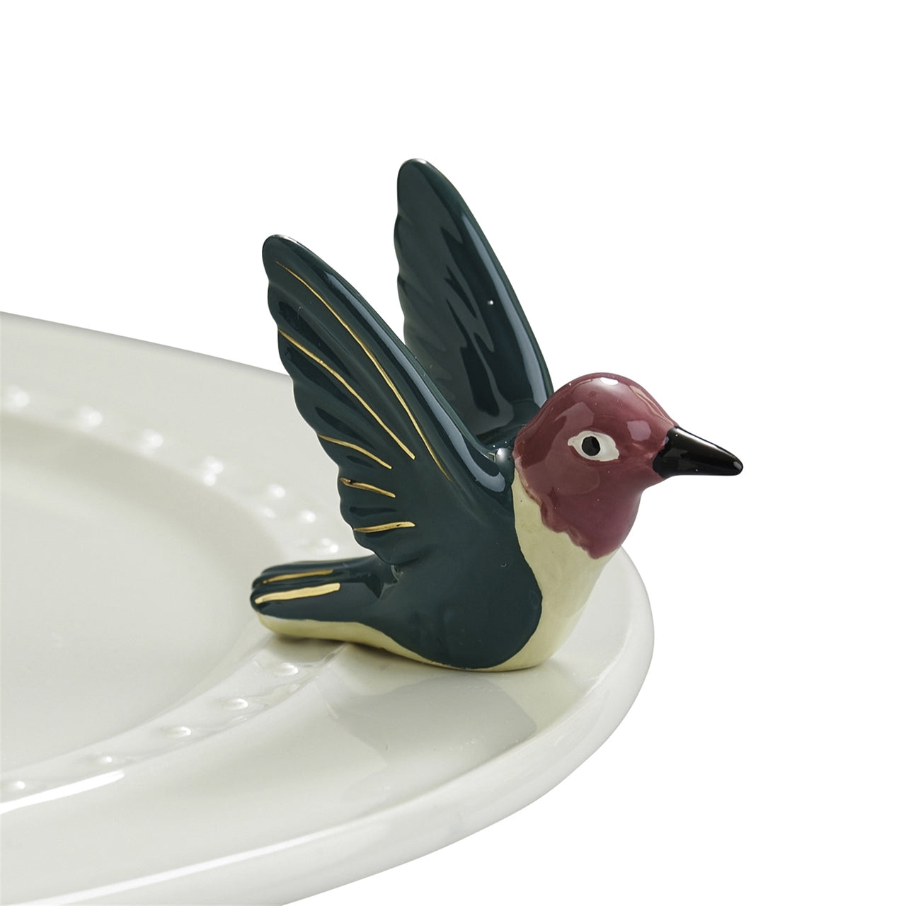 A274 Humm-Dinger mini by Nora Fleming. Green, purple and white hummingbird with gold accents. Shop The Painted Cottage in Edgewater, MD.