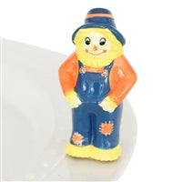 A286 Hay There! Scarecrow mini in yellow, blue and orange. by Nora Fleming. Shop at The Painted Cottage in Edgewater, MD.