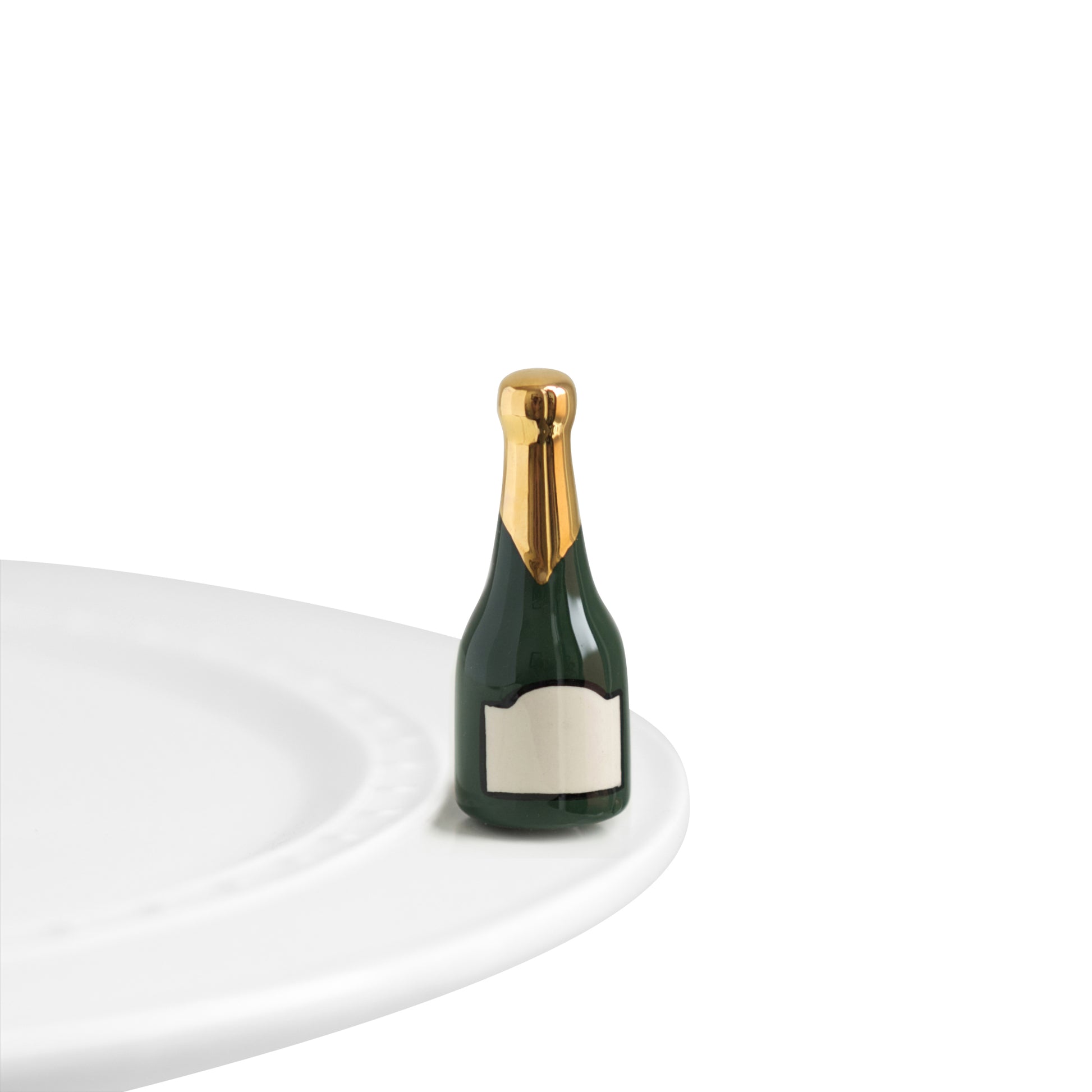 A94 Nora Fleming Champagne Celebration mini features green champagne bottle with white label and gold foil. Shop at The Painted Cottage an Annapolis boutique.