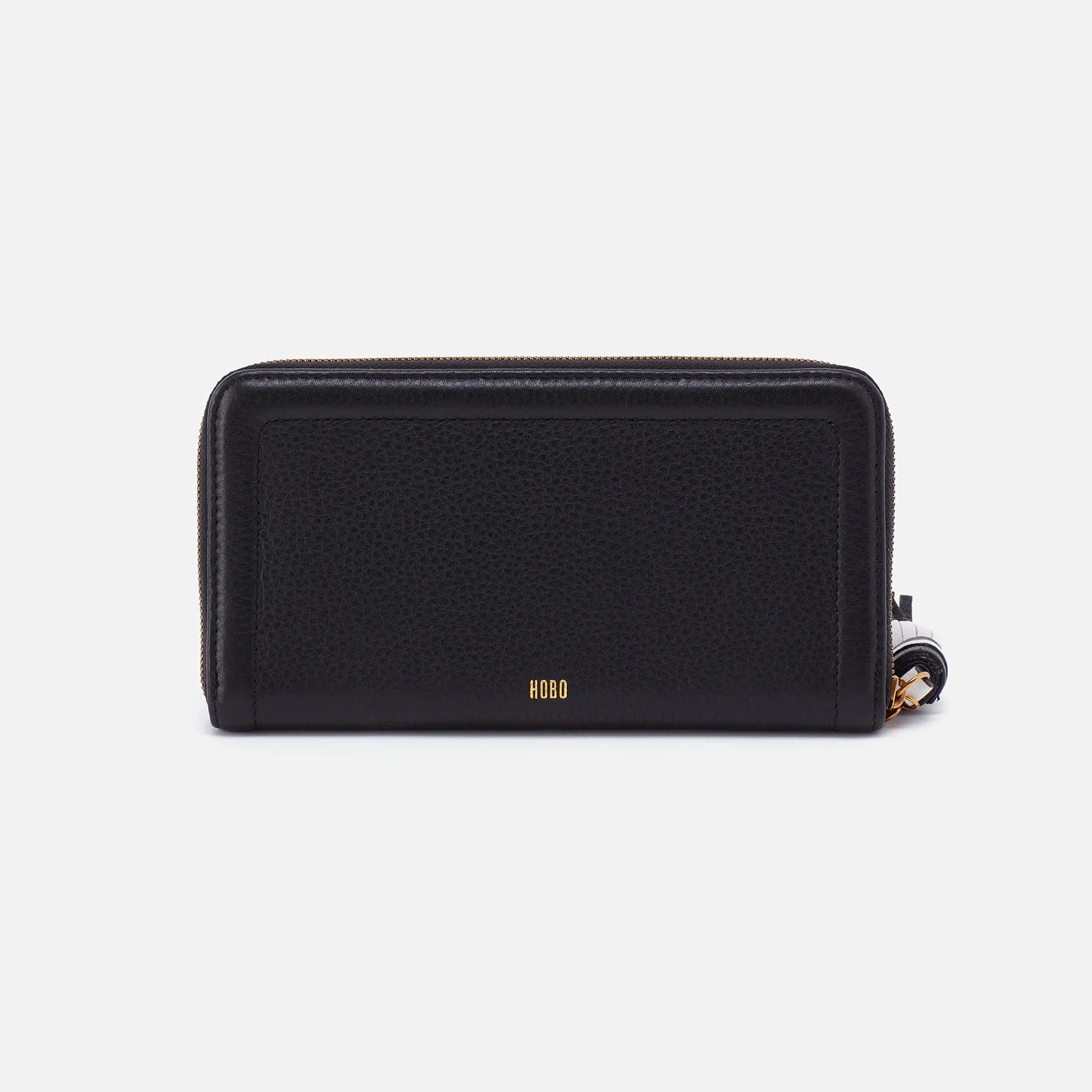 The Nila Large Zip Around Wallet in black is a continental design with interior organization for your cash and cards and a leather tassel zipper for added style and functionality. Check it out at the Painted Cottage in Edgewater, MD