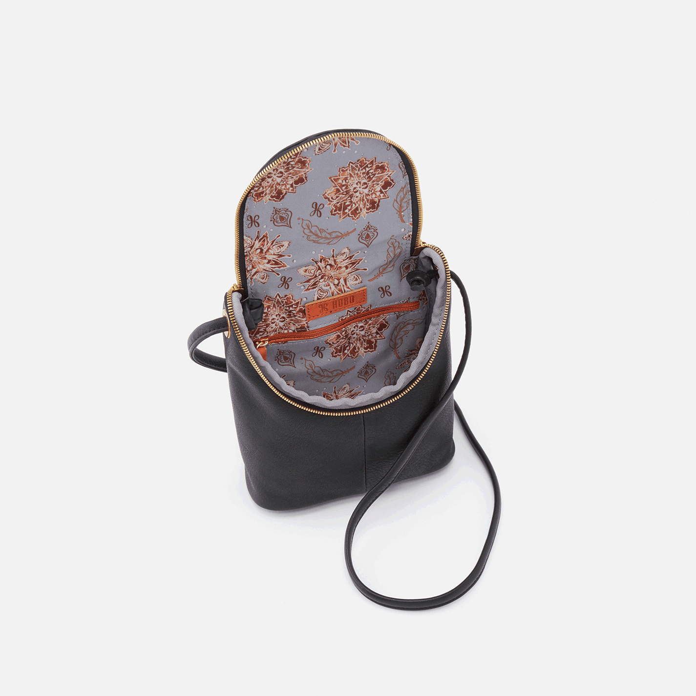 Hobo Fern Crossbody Black, exterior wall pocket, interior zip pocket, 26" Strap, 6" W x 7.5" H x 2" D drop. Available at The Painted Cottage in Edgewater, MD