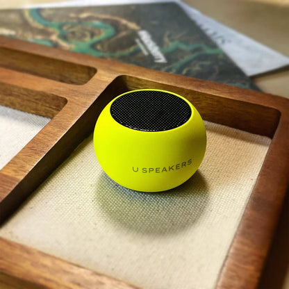 U Mini Speaker Glow in the Dark Yellow is stylish and delivers exceptional sound. Features selfie remote control, bluetooth pairing, magnetic base, micro USB charging cable, pair & sync with other U Speakers. Shop at The Painted Cottage in Edgewater MD.