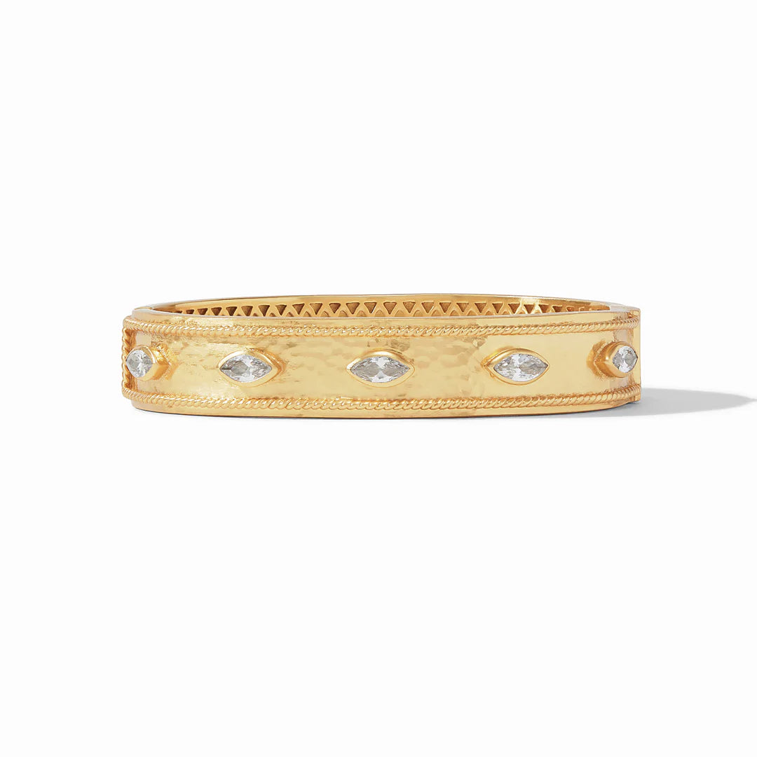 Monaco Hinge Bangle Cubic Zirconia by Julie Vos. Lightly hammered gold and marquise CZs. Diameter: 2.5", 24K gold plate. Shop at The Painted Cottage in Edgewater, MD.