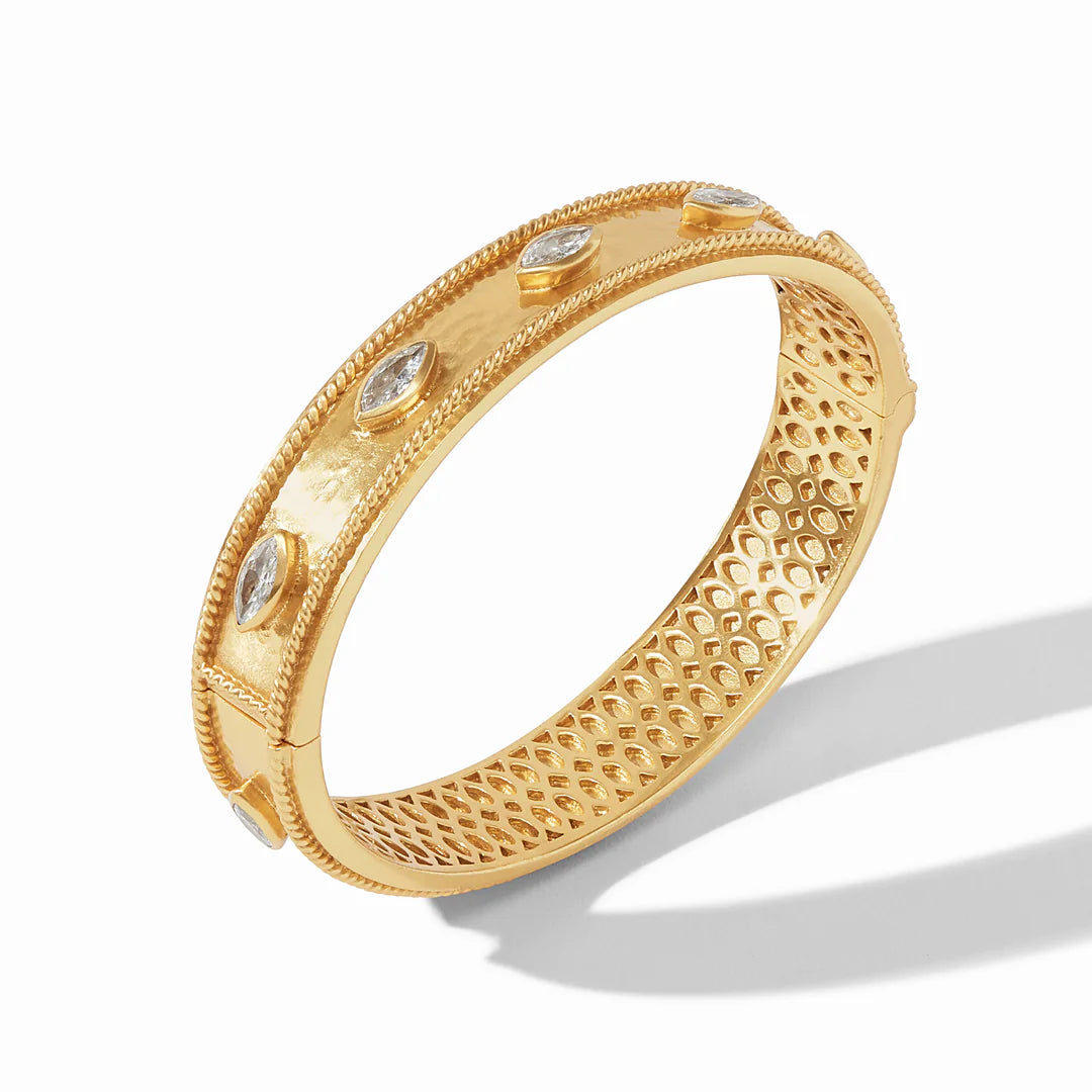 Monaco Hinge Bangle Cubic Zirconia by Julie Vos. Lightly hammered gold and marquise CZs. Diameter: 2.5", 24K gold plate. Shop at The Painted Cottage in Edgewater, MD.