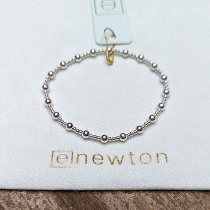 Classic sterling silver 4mm Sincerity bracelet by eNewton. Shop at The Painted Cottage in Edgewater, MD