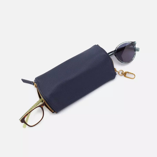 The Spark in sapphire blue is a double eyeglass case that has an easy-to-use clip for attaching to your bag and two compartments for your favorite glasses. Find it at the Painted Cottage in Edgewater, MD