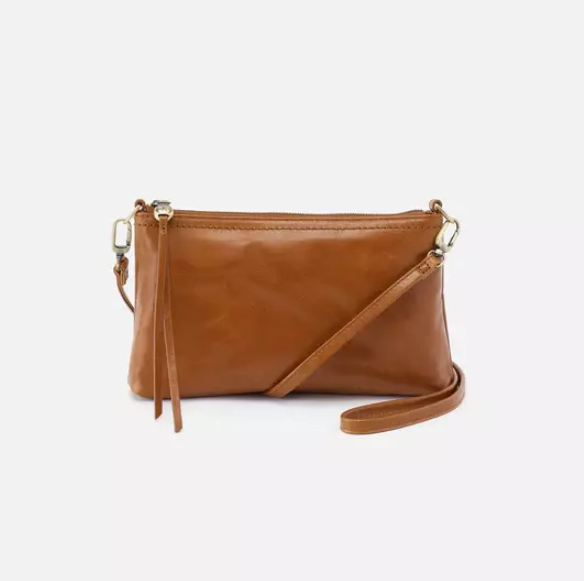 This iconic and convertible Darcy Truffle by HOBO can be worn three ways: crossbody, baguette bag and wristlet. Crafted in our Vintage Hide leather that only gets more beautiful over time with use and wear. For sale at the Painted Cottage in Edgewater, MD