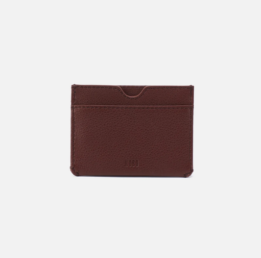 The Leather Men's Credit Card Wallet in brown has a minimalist design with room for your most-used cards. Check it out at the Painted Cottage in  Edgewater, MD