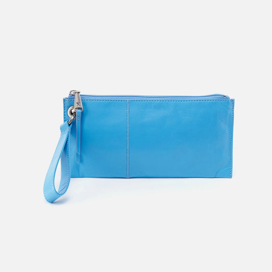 Vida Wristlet Tranquil Blue by HOBO features convenient wristlet strap, zipper closure, room for your phone and credit card slots. Shop at The Painted Cottage in Edgewater, MD.