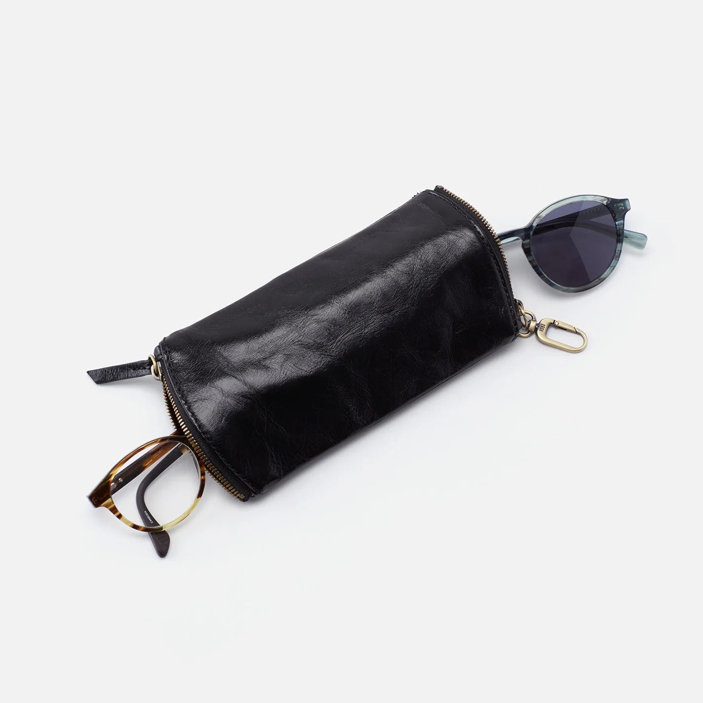 The Spark in vintage black is a double eyeglass case that has an easy-to-use clip for attaching to your bag and two compartments for your favorite glasses. Check it out at the Painted Cottage in Edgewater, MD
