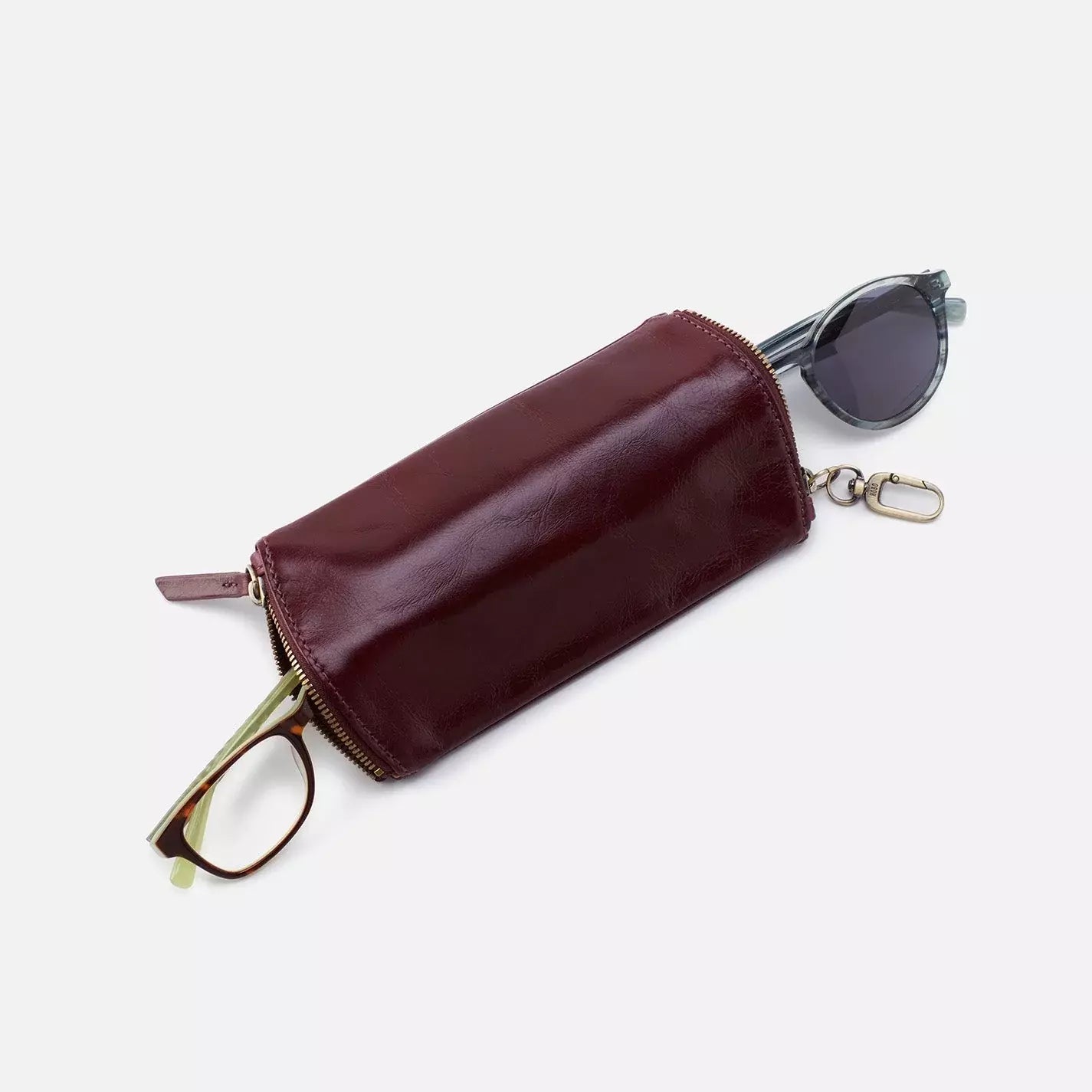 The Spark in merlot is a double eyeglass case that has an easy-to-use clip for attaching to your bag and two compartments for your favorite glasses. Find it at the Painted Cottage in Edgewater, MD