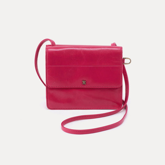 The Jill Wallet Crossbody in fuchsia by HOBO has an intentional design with wallet organization on the back and enough room to hold your phone, keys and other on-the-go necessities. Look for it at the Painted Cottage in Edgewater, MD