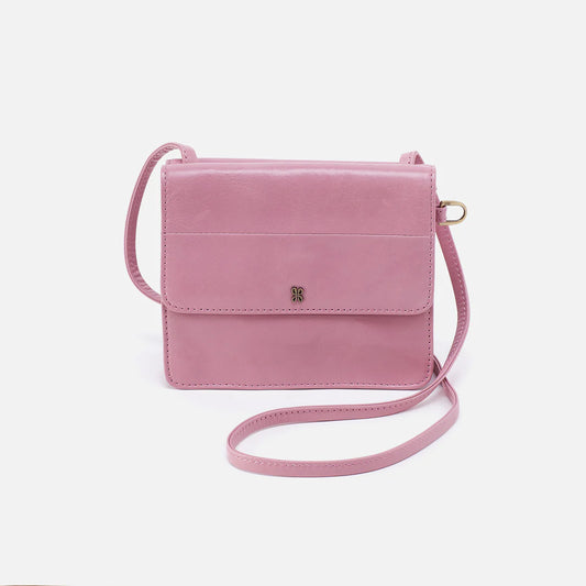 The Jill Wallet Crossbody in lilac rose has an intentional design with wallet organization on the back and enough room to hold your phone, keys and other on-the-go necessities. Find it at the Painted Cottage in Edgewater, MD