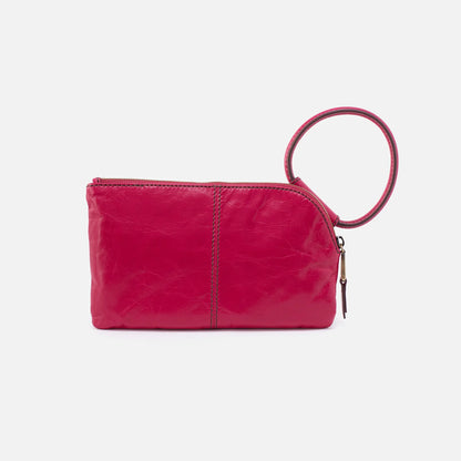 Designed with our signature circular handle, the Sable in fuchsia will securely stow away your essentials as you grab it and go. Crafted in our Vintage Hide leather that only gets more beautiful over time with use and wear. For sale at the Painted Cottage in Edgewater, MD