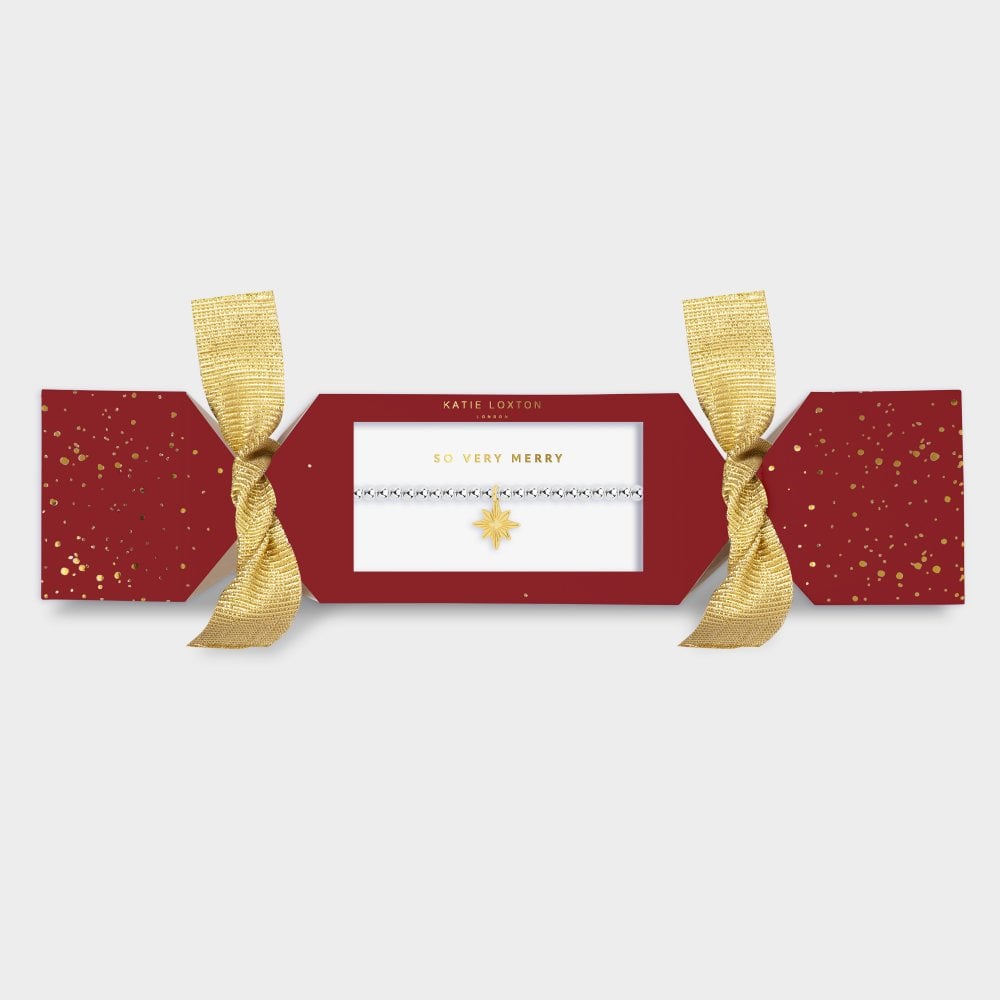 Katie Loxton silver stretch bead bracelet with gold plated Christmas Star charm in So Very Merry Cracker packaging