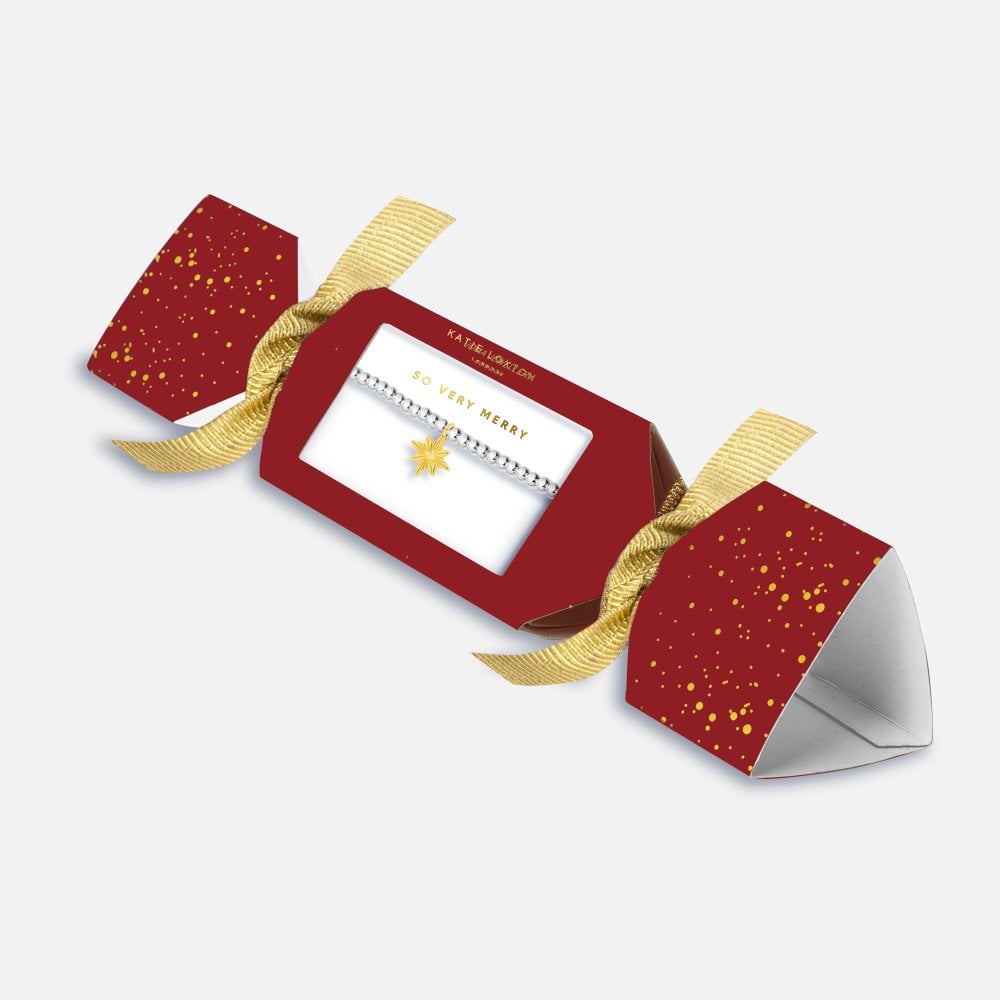 Katie Loxton silver stretch bead bracelet with gold plated Christmas Star charm in So Very Merry Cracker packaging
