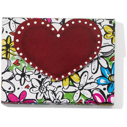 Brighton Love Heart Notepad Width: 4" Height: 3" with magnetic closure features 75 pages with beautifully printed card stock cover. Shop at The Painted Cottage in Edgewater, MD