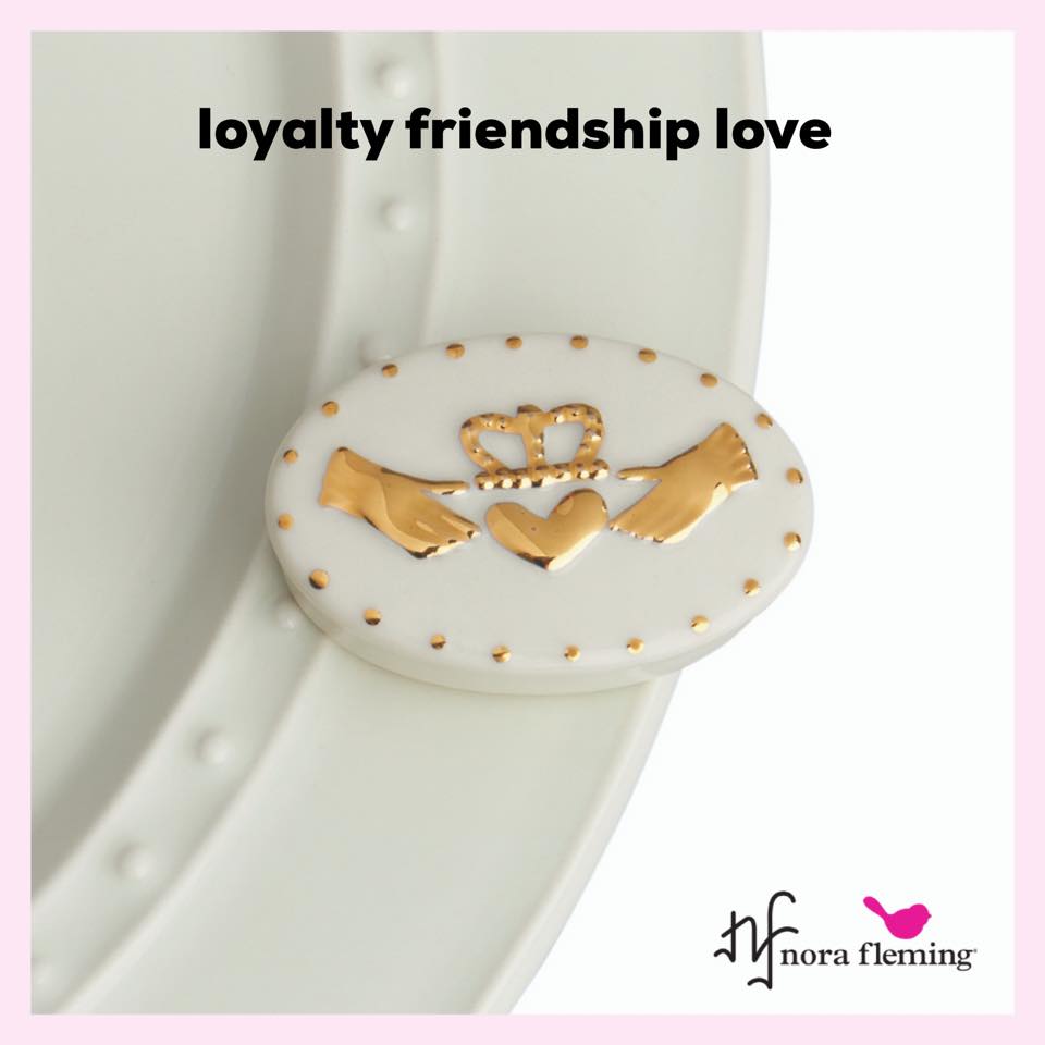 A264 NF Loyalty Friendship Love mini available at The Painted Cottage in Edgewater MD. Two hands embracing a heart adorned with a crown symbolize the purity of a cherished relationship. Gold tone on white.