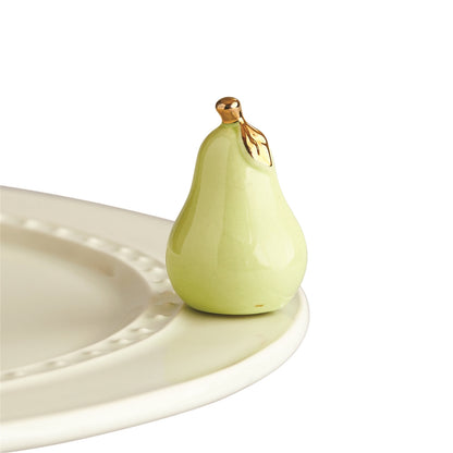 A242 Nora Fleming Pear-fection green pear with gold tone leaf/stem mini. Shop at The Painted Cottage in Edgewater, MD.